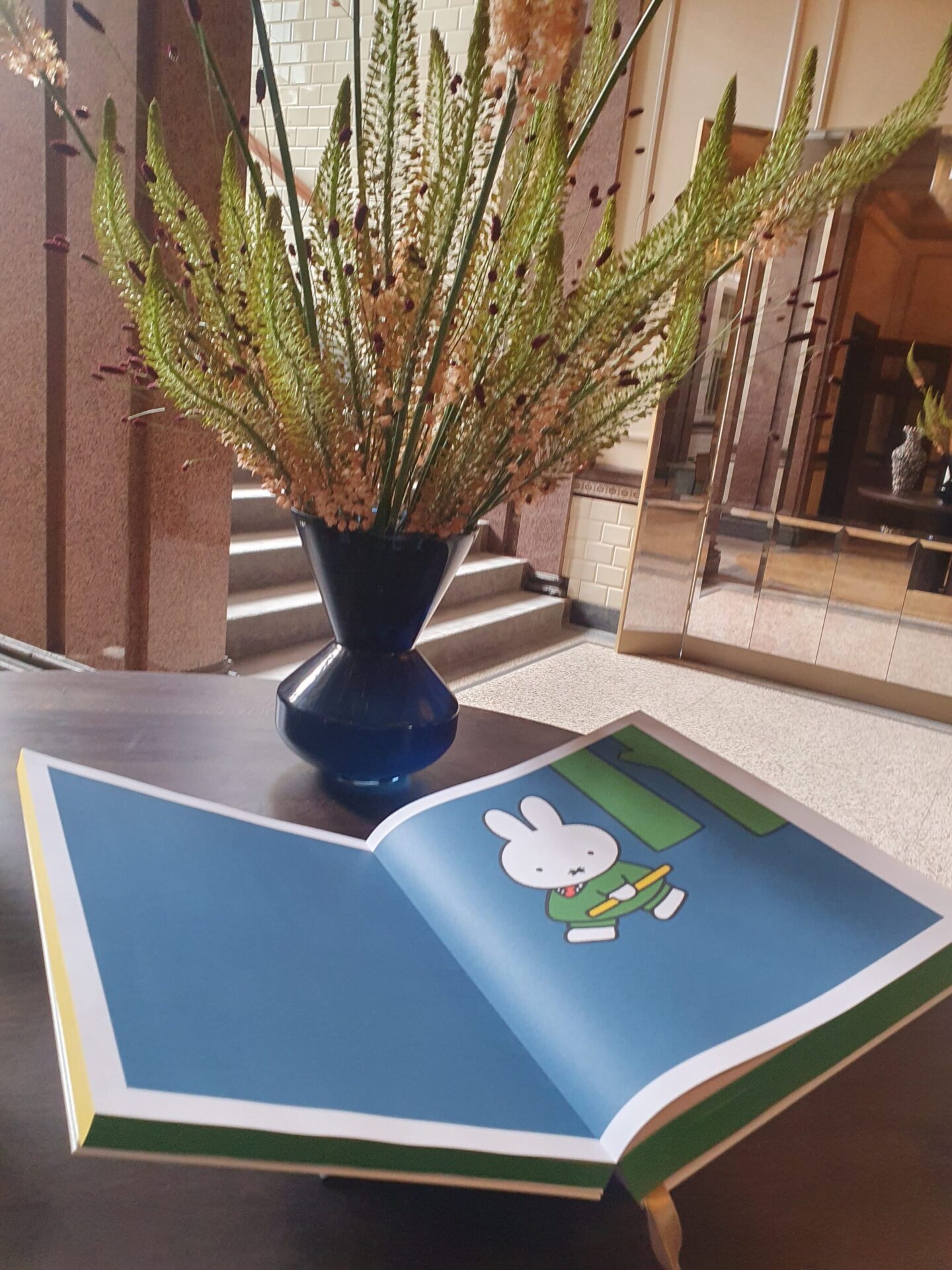 Large open Miffy book displayed at Rosewood Amsterdam, adding a playful Dutch design element to the interior
